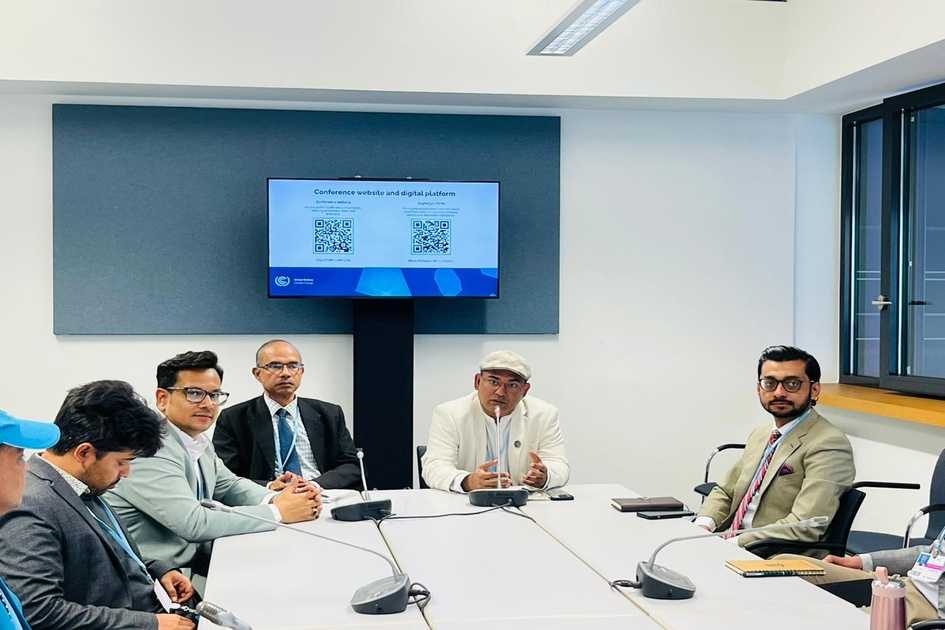 Dr. Saimum Parvez addresses a meeting of Bangladeshi delegates in Bonn, Germany, where he briefed them on plans to form an expert panel under the environment ministry.